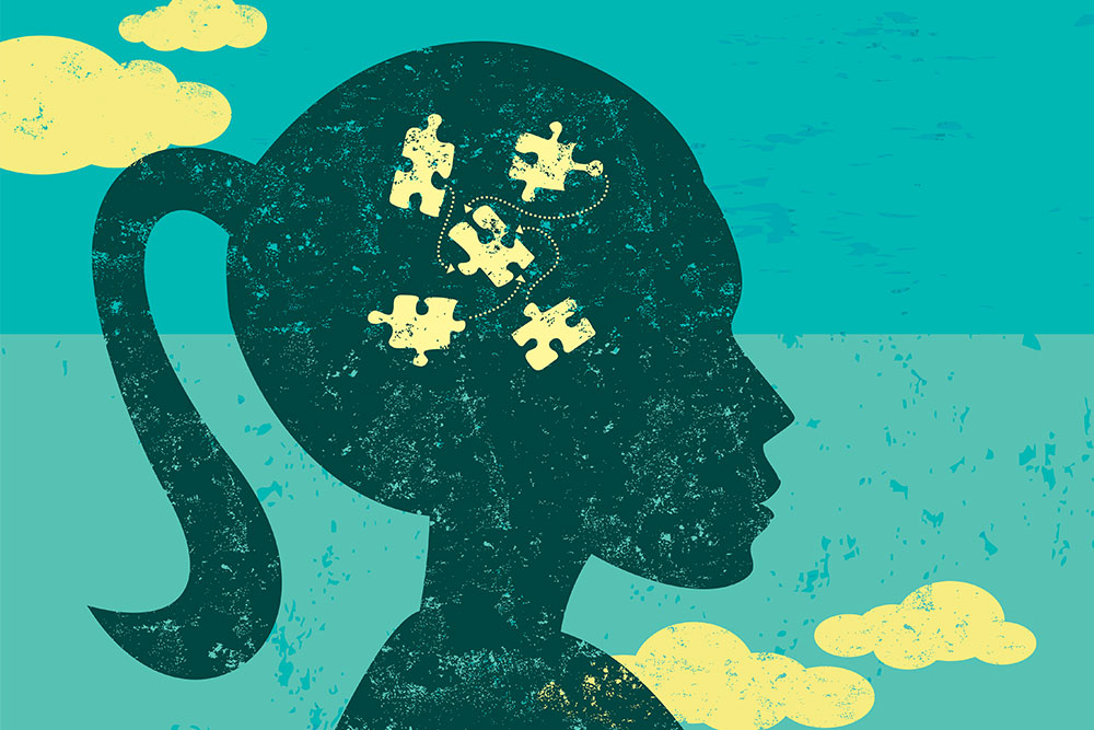 Illustration of silhouette of girl with puzzle pieces in her head