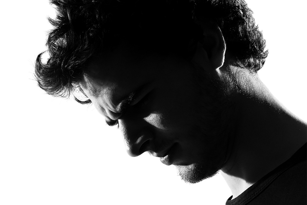 Stock photo black and white image of man looking troubled