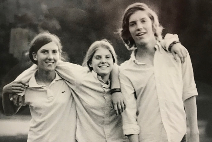 Family photo of Brooking siblings in black and white 