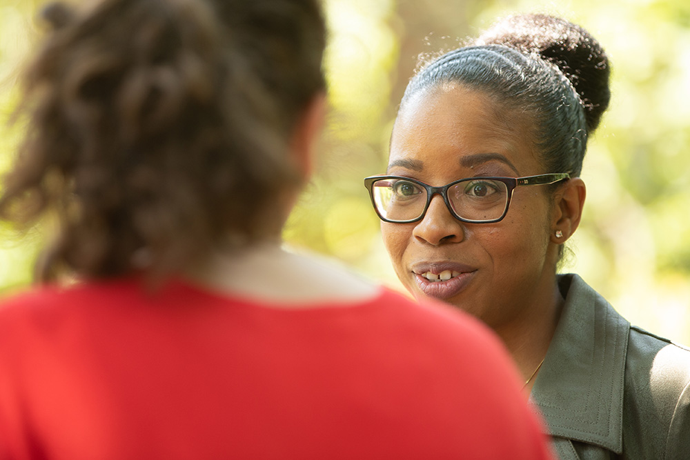 Doc and patient talk outside