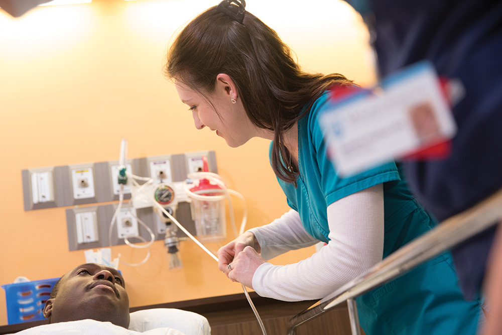 McLean nursing staff attend to a patient