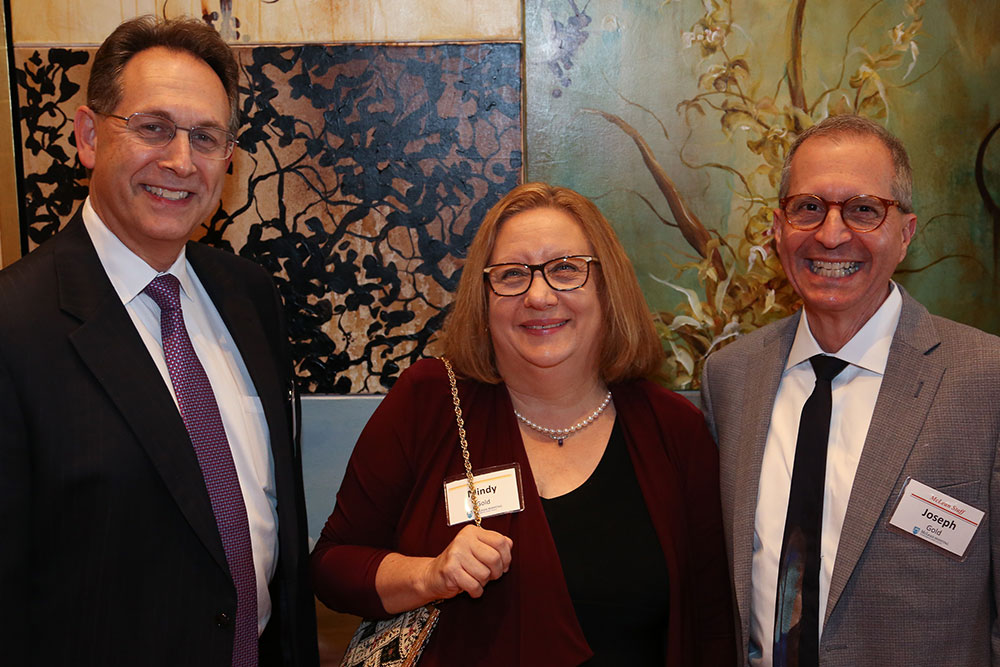 McLean President Scott L. Rauch (L) with Dr. Joseph Gold (R) and his wife Mindy Gold (C)