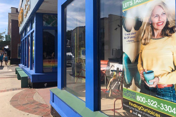 Storefront with poster in window