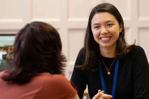 Clinician talks with patient