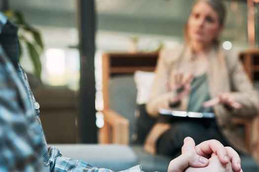 Patient talks to therapist