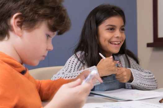 Two kids coloring