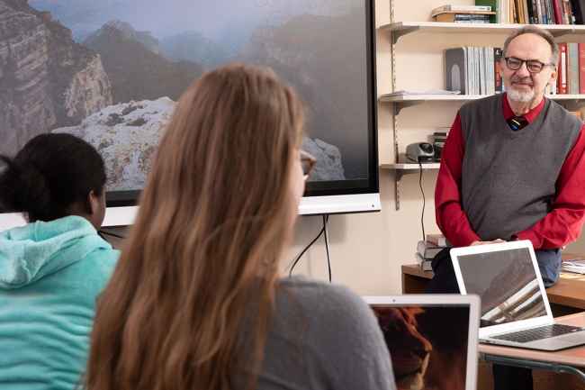 Teacher with media arts students