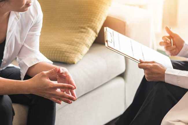 Therapist and patient talking