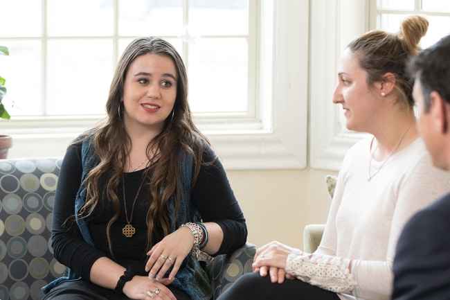 Young person talks to clinicians at McLean mental health treatment program