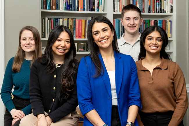A group of people smiling at the camera