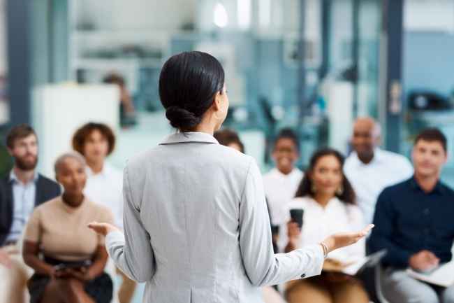 Woman presenting at an office