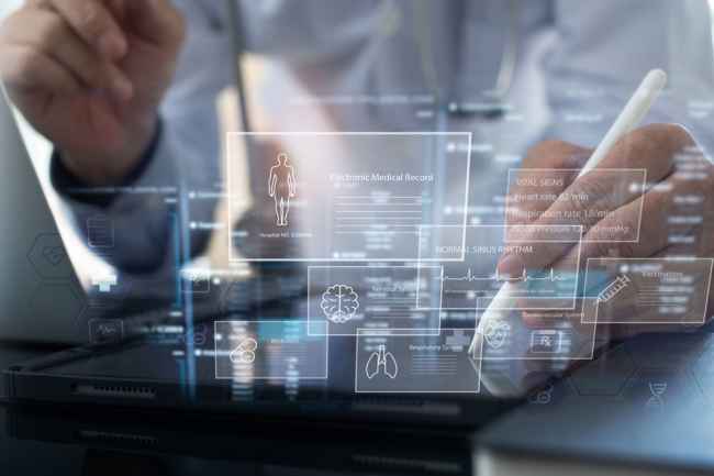 Doctor reviewing medical record data