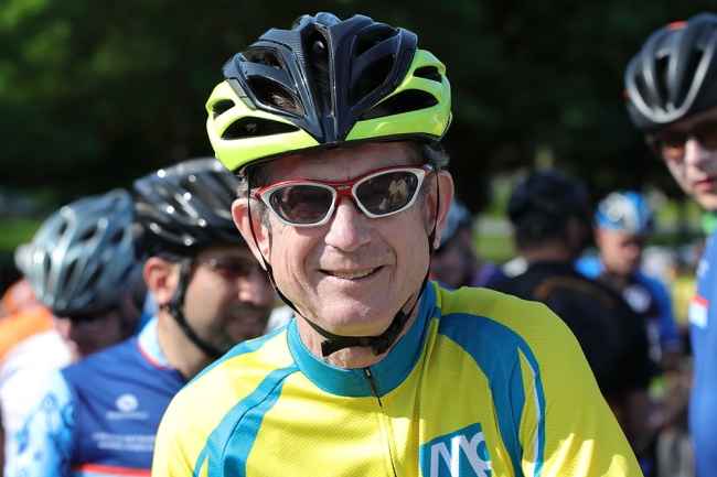Mac Dorris - man in bike helmet smiles out