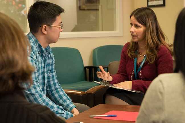 Clinician speaks with patient