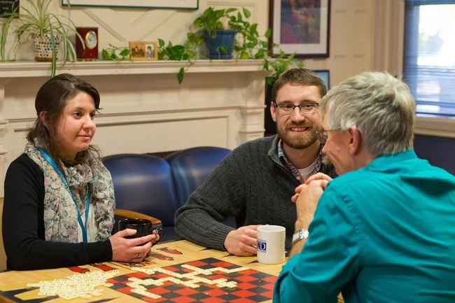 Staff talk with patient