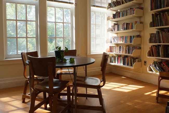 Sunny library with round table