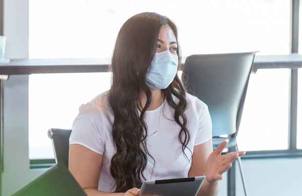 Female clinician in group therapy