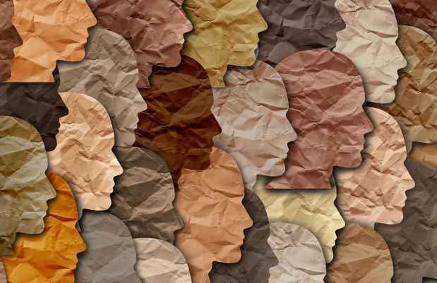 Graphic image of black and brown faces made out of paper
