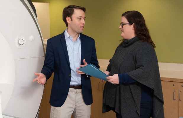 Researchers talk by MRI