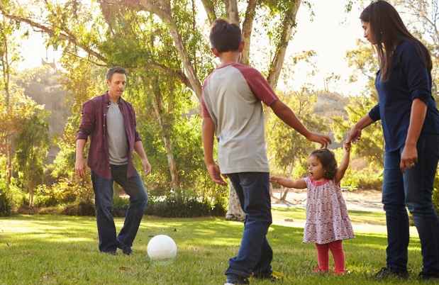 Family playing in the park