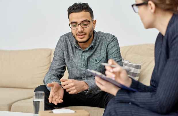 Patient talks to clinician