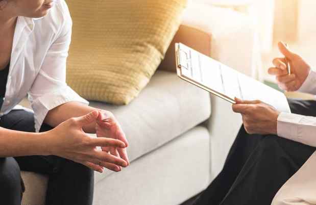Therapist and patient talking