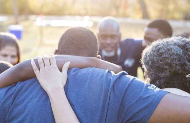 group of people hugging