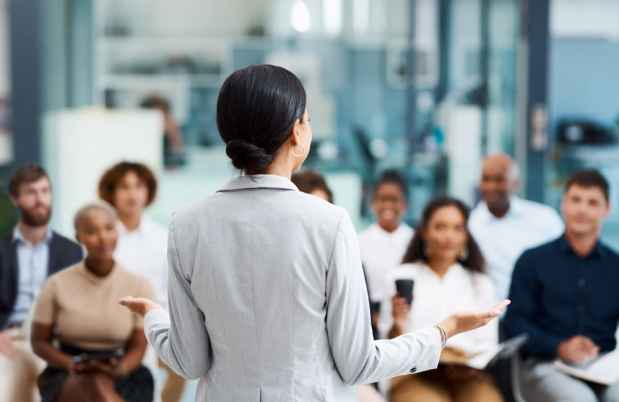 Woman presenting at an office