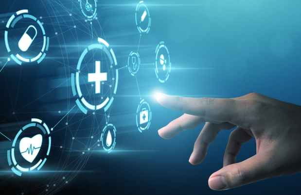 Hand with finger pointing at floating glowing icons
