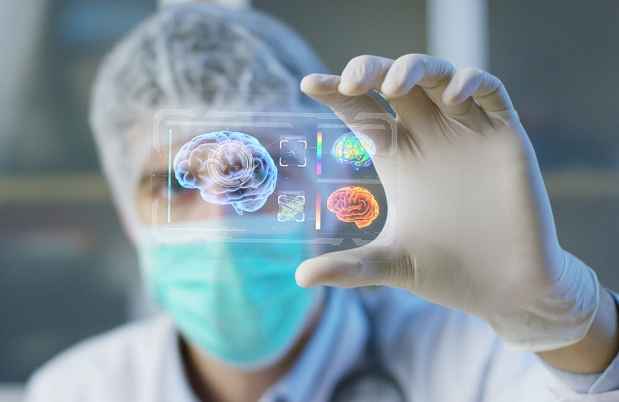 Scientist holding a futuristic brain scan display