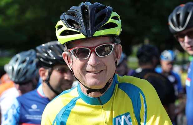 Mac Dorris - man in bike helmet smiles out