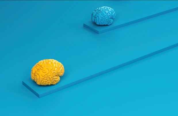 Illustration of a yellow brain among blue brains and a blue background