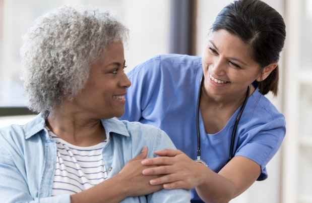 Stock photo of nurse and patient