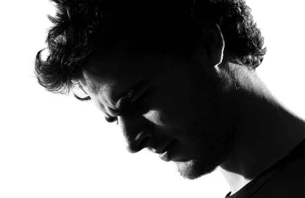 Stock photo black and white image of man looking troubled