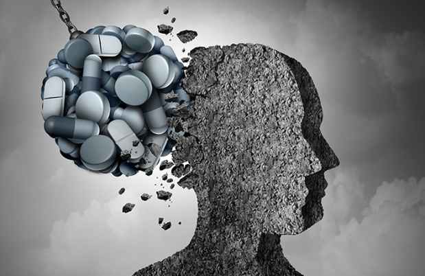Illustration of ball of pills hitting a head (like a wrecking ball)
