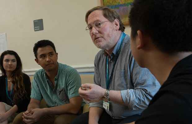 Dr. Alan Fruzzetti runs a boys group therapy session