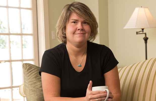 Woman sitting with coffee cup