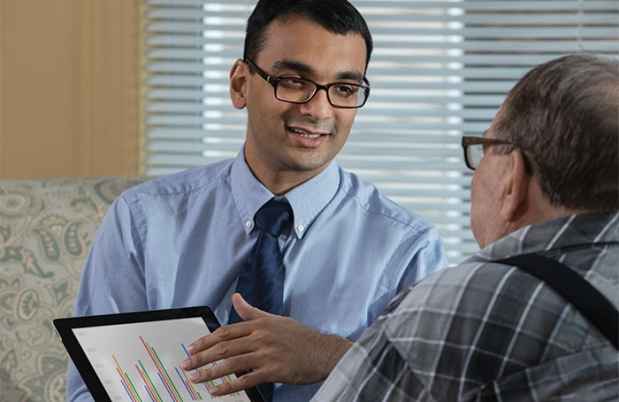 Dr. Ipsit Vahia with a patient