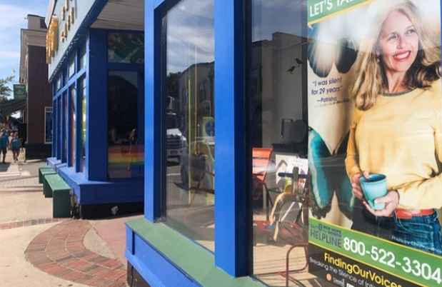 Storefront with poster in window