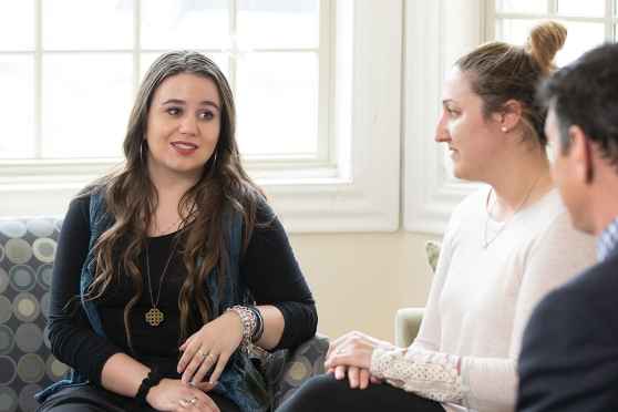 Young person talks to clinicians at McLean mental health treatment program