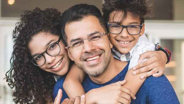 Dad with 2 kids hugging