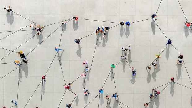Aerial photo of people outside connected by lines