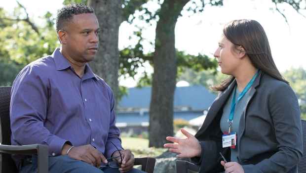 Patient talks to clinician
