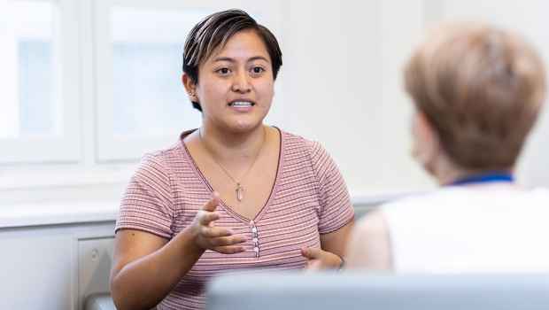 Patient talks to clinician