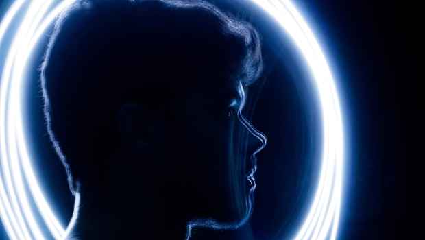 image of teen boy with light swirls around the head