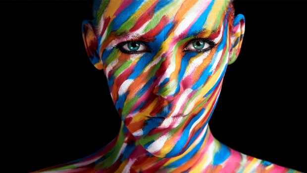 Face with artistically painted stripes