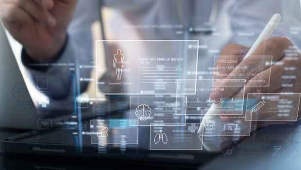 Doctor reviewing medical record data