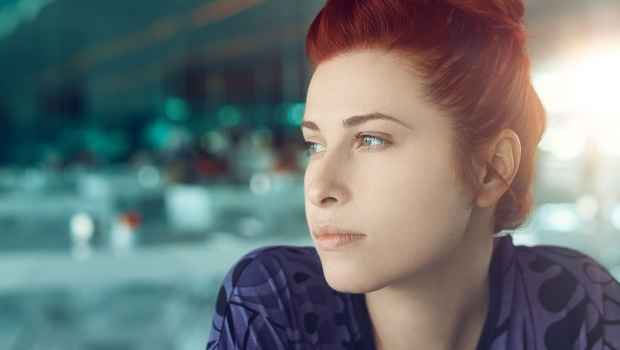 Person in empty office looks forlorn