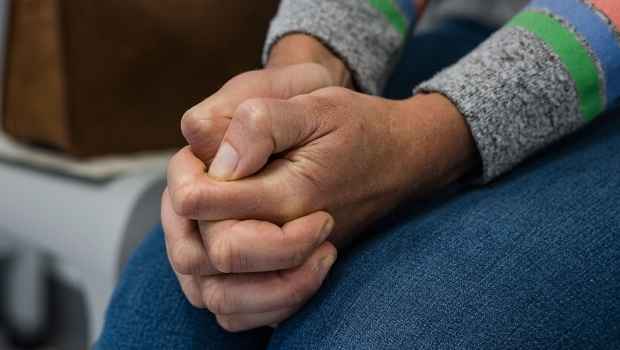Anxious hands of someone in a waiting room