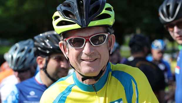 Mac Dorris - man in bike helmet smiles out